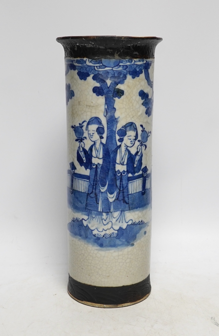 Oriental items to include a cylindrical blue and white vase with associated hardwood stand, a Japanese watercolour painting on silk together with a Japanese bamboo page turner